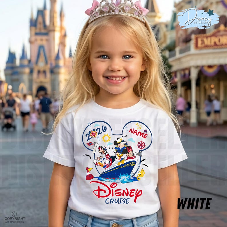 May include: A white t-shirt featuring a graphic of Mickey Mouse, Minnie Mouse, and Goofy on a cruise ship inside a Mickey Mouse ear silhouette. The design includes the text 2026, NAME, and Disney Cruise, with nautical icons like a ship wheel and anchor.