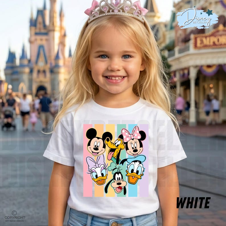 May include: A young girl wearing a white t-shirt featuring a colorful graphic of Disney characters, including Mickey Mouse, Minnie Mouse, Donald Duck, and Goofy. The shirt has vertical pastel stripes. The girl is also wearing a pink tiara.