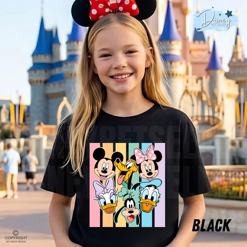May include: Black t-shirt featuring a colorful graphic of Mickey Mouse, Minnie Mouse, Donald Duck, Daisy Duck, Goofy, and Pluto. The shirt has a vertical striped background in pastel colors. The word "BLACK" is printed on the bottom right.