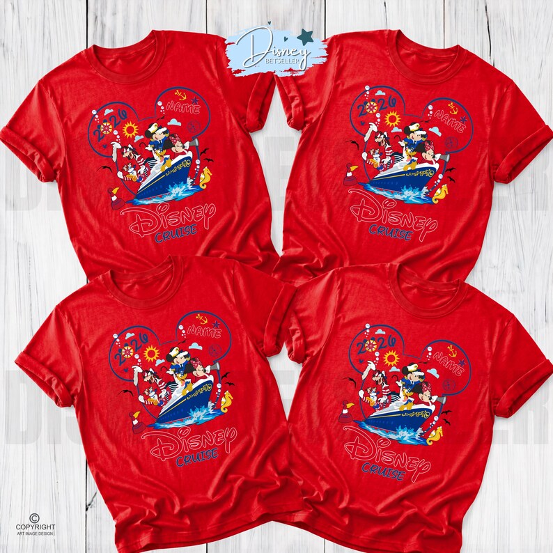 May include: Four bright red short-sleeved t-shirts featuring a graphic of Disney characters on a cruise ship inside a Mickey Mouse head outline. The design includes the text 2026, Name, and Disney Cruise in blue and red lettering on each shirt.