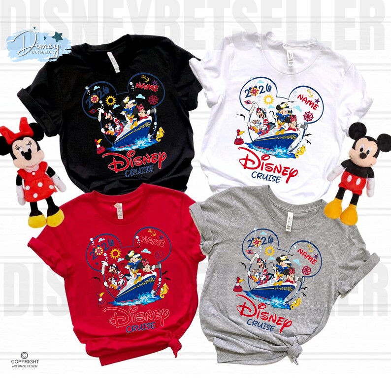 May include: Four short-sleeved t-shirts in black, white, red, and grey, each featuring a graphic of Disney characters on a cruise ship inside a Mickey Mouse ear outline. The design includes the text 2026, Name, and Disney Cruise. Two plush dolls.