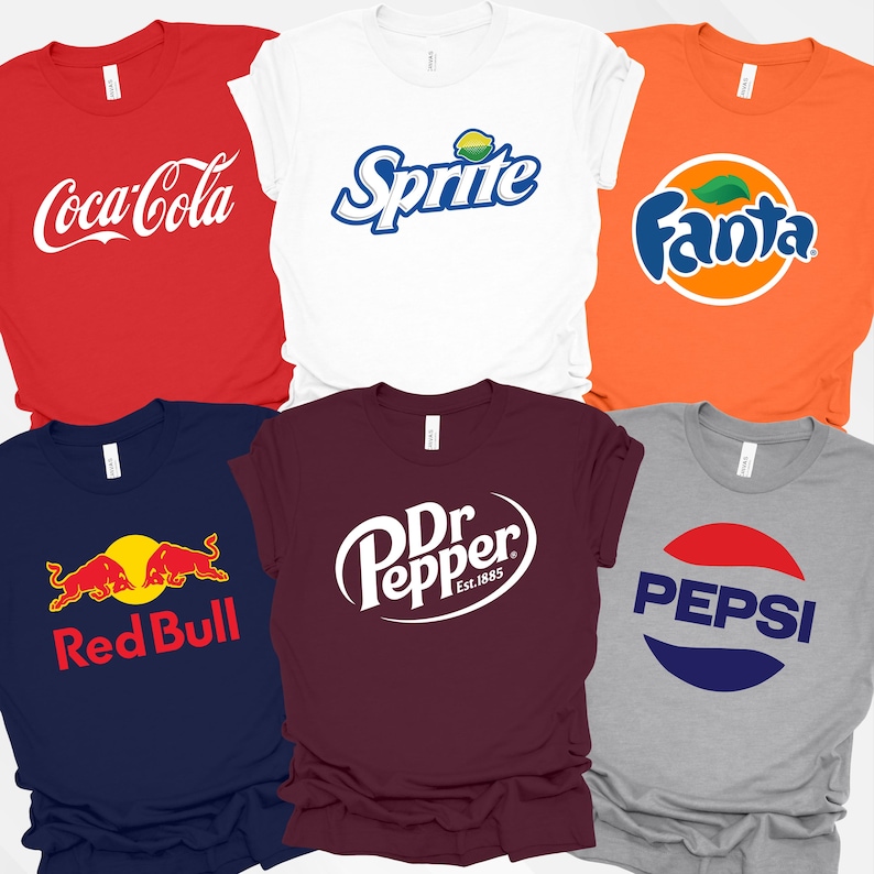 May include: A collection of six t-shirts in various colors, each featuring a different soda brand logo. The shirts include Coca-Cola, Sprite, Fanta, Red Bull, Dr. Pepper, and Pepsi. The logos are in their original colors and designs.