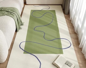 Tapis crème et vert dessin au trait abstrait