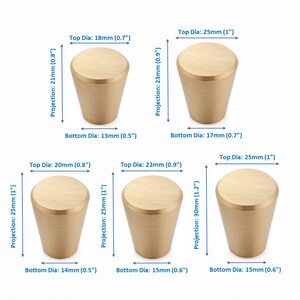 May include: Five brushed gold cabinet knobs of varying sizes. Each knob has a tapered cylindrical shape. Dimensions are labeled: top diameters range from 0.7 to 1 inch, bottom diameters from 0.5 to 0.7 inches, and projections from 0.8 to 1.2 inches.