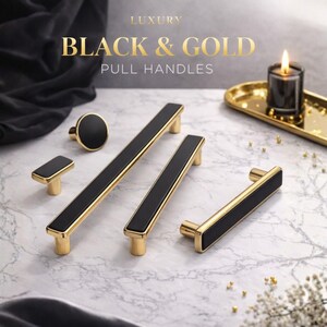May include: A collection of luxury black and gold pull handles and a knob. The hardware features a smooth black center inlay framed by polished gold metal. Text on the image reads LUXURY BLACK & GOLD PULL HANDLES. The items are arranged together.