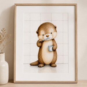 Könnte beinhalten: Ein gerahmter Kunstdruck, der einen braunen Otter in einem weiß gefliesten Badezimmer zeigt. Der Otter hält einen kleinen blauen Becher mit einem weißen Sternmotiv in der einen Hand und putzt sich mit der anderen Hand die Zähne.