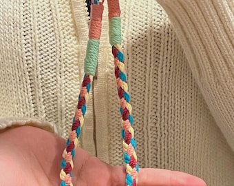Hand-woven paracord phone straps in blue and yellow brightly colored woven rope bag accessories