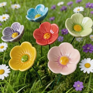 Peut inclure: Un ensemble de six tuteurs de jardin en forme de fleurs en céramique de différentes couleurs, dont bleu, violet, rouge, jaune, vert clair et rose pâle. Chaque fleur présente une finition brillante avec un centre jaune ou vert en relief.