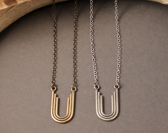 Chel arc necklace in sterling silver or brass