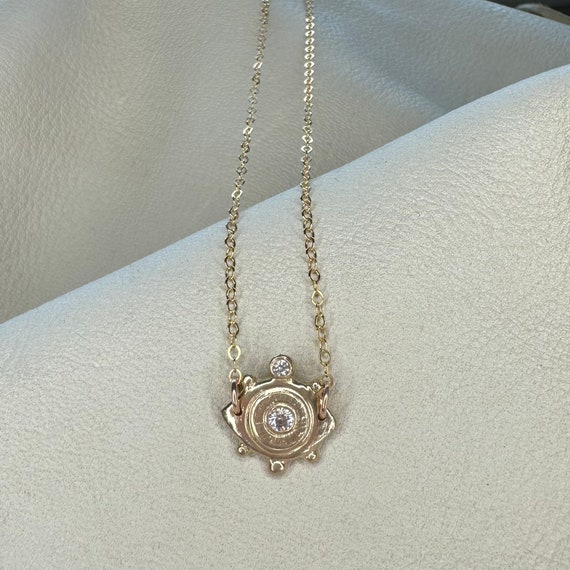 Evil eye necklace in bronze and sapphire or cubic zirconia