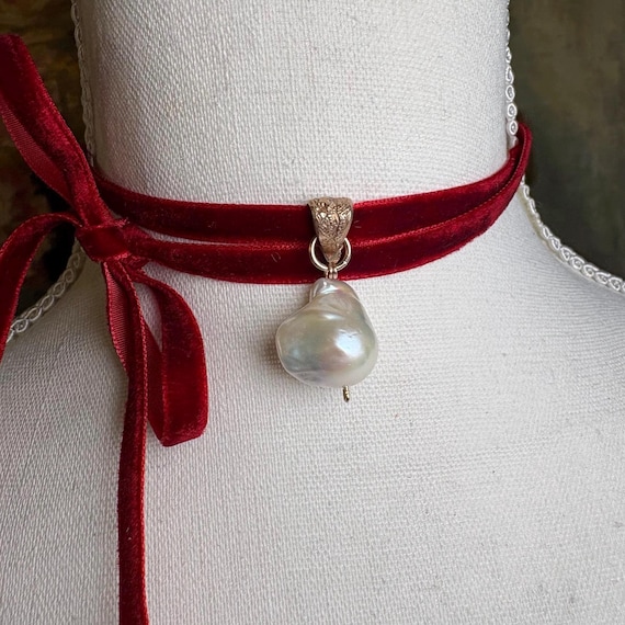 Creamy baroque pearl and bronze pendant on velvet ribbon