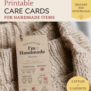 May include: A rectangular kraft paper care tag with dark brown text and icons, featuring the words 'Handle with care I'm Handmade' and laundry instructions. The tag hangs by a jute string over a beige knitted fabric. Text includes 'Instant PDF Download' and '2 Styles + 2 Layouts Included'.