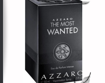 May include: A black rectangular box of Azzaro "The Most Wanted" Eau de Parfum Intense. The box features the brand name and product name in white lettering. The bottom of the box indicates the volume is 100 ml and 1.3 fl oz.