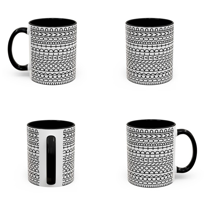 May include: A white ceramic mug with a black interior and handle, featuring a repeating black geometric pattern of lines, circles, and triangles. The text "FUCK DONALD TRUMP" is printed vertically in black letters along the side of the mug handle.