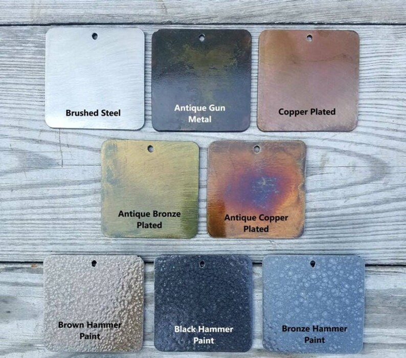 May include: Nine square metal samples, showcasing various finishes. Brushed steel, antique gun metal, copper plated, antique bronze plated, antique copper plated, brown hammer paint, black hammer paint, and bronze hammer paint.