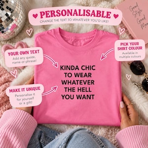 May include: A bright pink crew neck t-shirt featuring the black printed text KINDA CHIC TO WEAR WHATEVER THE HELL YOU WANT. The shirt is displayed with surrounding promotional text boxes and arrows indicating customisation options for the garment.