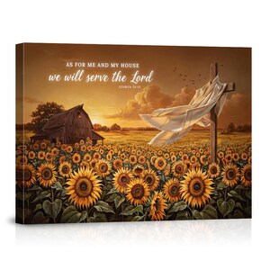 May include: A rectangular canvas wall art print featuring a field of yellow sunflowers under a golden sunset sky. A wooden barn stands on the left, and a wooden cross draped with white fabric stands on the right. Text reads: AS FOR ME AND MY HOUSE we will serve the Lord JOSHUA 24:15.