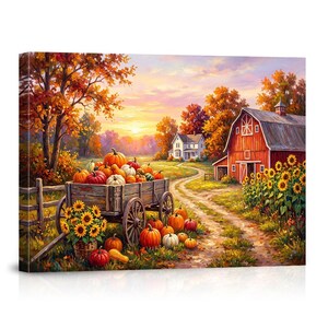 May include: A rectangular canvas print depicting a rural autumn landscape with a wooden wagon filled with orange and white pumpkins. A red barn, a white house, sunflowers, and trees with fall foliage are visible under a soft sunset sky.