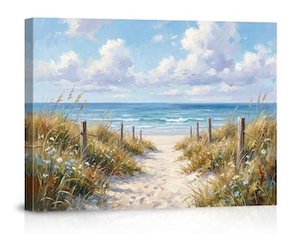 May include: A canvas print of a beach scene. A sandy path leads to the ocean, framed by tall grasses and wooden posts with rope. The sky is blue with fluffy white clouds, and the ocean is a vibrant turquoise.