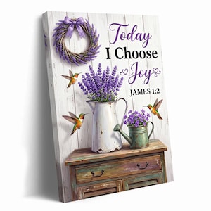 May include: A wall art print on a white wood background featuring a lavender wreath with a purple gingham bow, a white pitcher filled with lavender, a green watering can with purple flowers, and two hummingbirds with the text Today I Choose Joy JAMES 1:2.