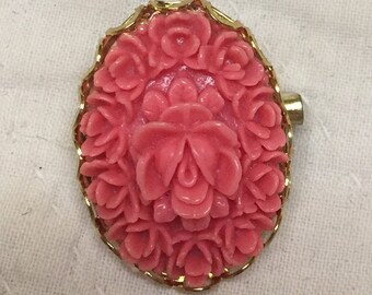 Oval brooch with faux coral cabochon