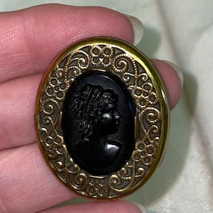 black cameo brooch