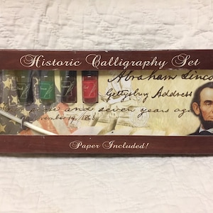 Historic calligraphy set with quill pen and powdered ink