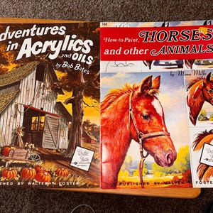 May include: Two vintage art instruction books. One titled "Adventures in Acrylics and Oils" by Bob Bates, featuring a barn illustration. The other, "How to Paint Horses and other Animals" by Mona Mills, with a horse portrait. Both published by Walter T. Foster.