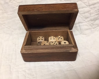 Wooden dice set in wooden box
