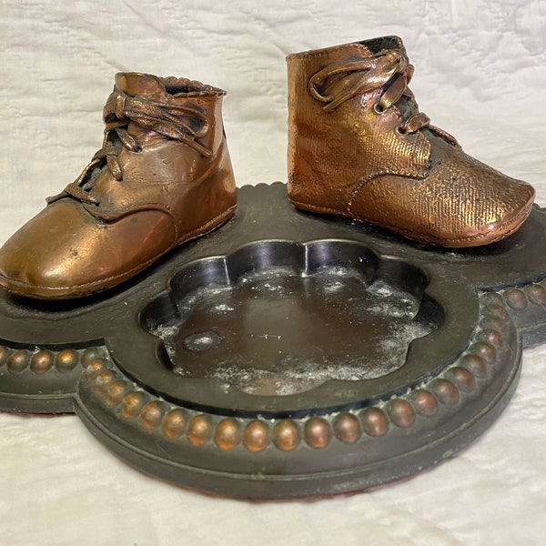 bronzed baby shoes ashtray or trinket holder probably by Bron Shoe Company