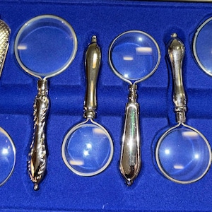 Small magnifying glass with decorative metal handle assorted styles