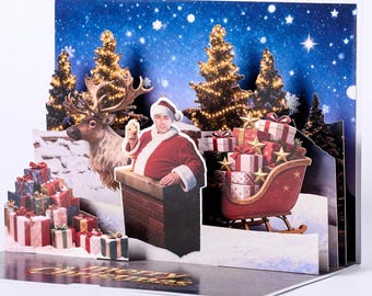 Tarjeta desplegable personalizada con cara de Papá Noel, recuerdo navideño personalizado con escena invernal en 3D y foto.