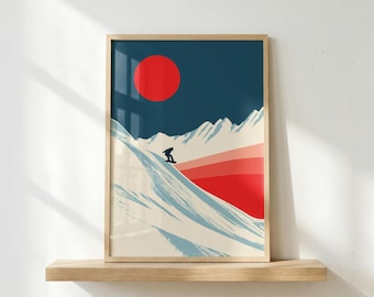Puede incluir: Una lámina enmarcada que muestra un paisaje de montaña estilizado con un cielo azul oscuro, un gran sol rojo y la silueta de una persona practicando snowboard en una ladera nevada con bandas horizontales de color rojo y rosa.