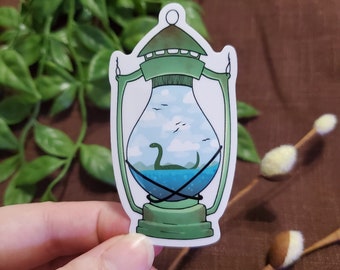 Nessie in Lantern Vinyl Sticker: Loch Ness Monster Cryptid