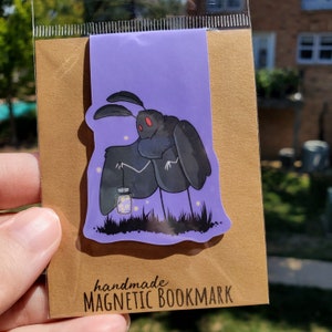 Mothman Carrying a Lantern of Fireflies Magnetic Bookmark