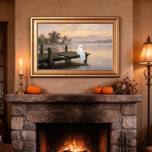 May include: A framed landscape painting depicting a white ghost sitting on a weathered wooden dock extending into a misty lake at sunset. The scene features soft orange and purple sky tones, calm water, and distant trees under a hazy horizon.