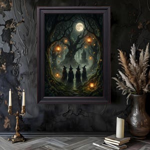May include: A framed wall art print depicting four figures in dark cloaks and pointed hats standing in a forest at night. The scene features a full moon, glowing hanging lanterns, mossy trees, and a distant stone tower under a dark, moody sky.