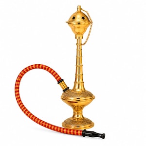 May include: A gold-colored metal hookah featuring a tall, slender stem and a rounded base with intricate engraved patterns. The top includes a dome-shaped cover with star-shaped cutouts and a small chain. A flexible red and gold hose is attached.
