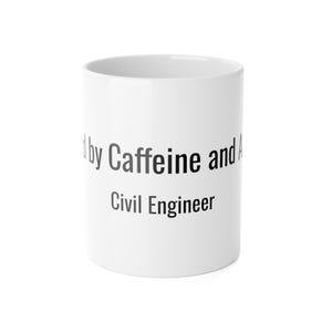 Peut inclure: Mug en céramique blanche avec l'inscription "Fueled by Caffeine and A... Civil Engineer" en lettres noires. La tasse est cylindrique et semble vide.