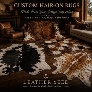 May include: A selection of custom hair-on rugs in various shapes and patterns, including a black and white cowhide rug, a brown and white rug, and a checkered rug. The rugs are displayed on a dark wood floor. The text reads "CUSTOM HAIR-ON RUGS Made From Your Design Inspiration."