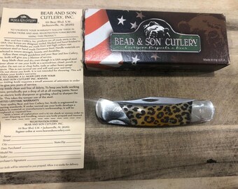 Bear & Son USA mint in box Leopard spots bone Trial Run serrated lockback knife