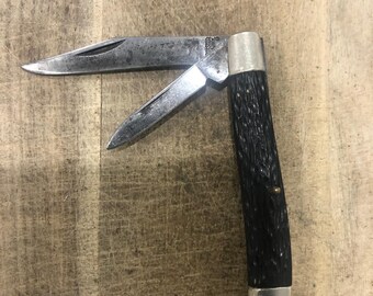 Nóż Kutmaster Peanut Utica NY USA Czarne uchwyty Delrin Ostrza CS 2 7/8" Zamknięte