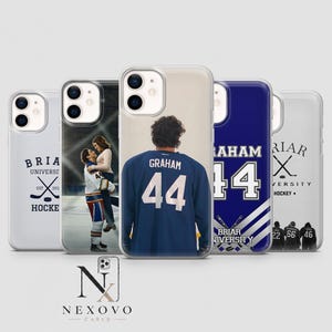 May include: A collection of phone cases featuring hockey-themed designs. One case displays a couple, another showcases a hockey jersey with the name "GRAHAM" and the number "44". Other cases have the text "BRIAR UNIVERSITY HOCKEY".
