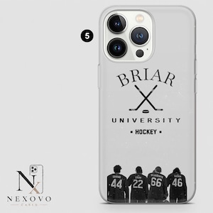 May include: Clear phone case with a design featuring the text "BRIAR UNIVERSITY HOCKEY" and crossed hockey sticks. Below are four figures with jersey numbers 44, 22, 66, and 46. The case has a clear border.