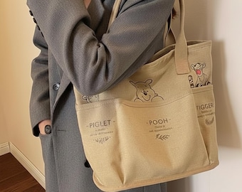 Bolso de lona Winnie the Pooh, bolso de hombro retro, gran capacidad, bonito bolso multibolsillos para libros, inspirado en Disney.