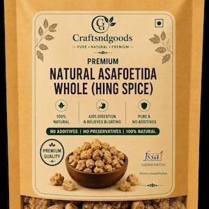 May include: A tan stand-up pouch containing natural asafoetida whole hing spice. The label features the text Craftsndgoods, Premium Natural Asafoetida Whole (Hing Spice), 100% Natural, Aids Digestion & Relieves Bloating, Pure & No Additives, and fssai 22224067001729.