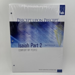 May include: A shrink-wrapped study guide titled Precept Upon Precept Isaiah Part 2 Comfort My People. The cover features a blue and white design with text, a NASB logo, and three punched holes along the left side for binder storage.