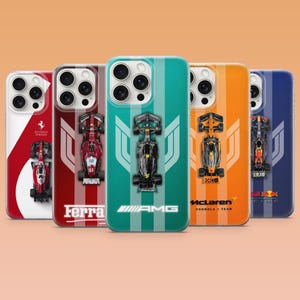 May include: Five phone cases with Formula 1 race car designs. Each case displays a different team's colours and logo, including Ferrari, AMG, and McLaren. The cases have a glossy finish and a detailed graphic of a race car.