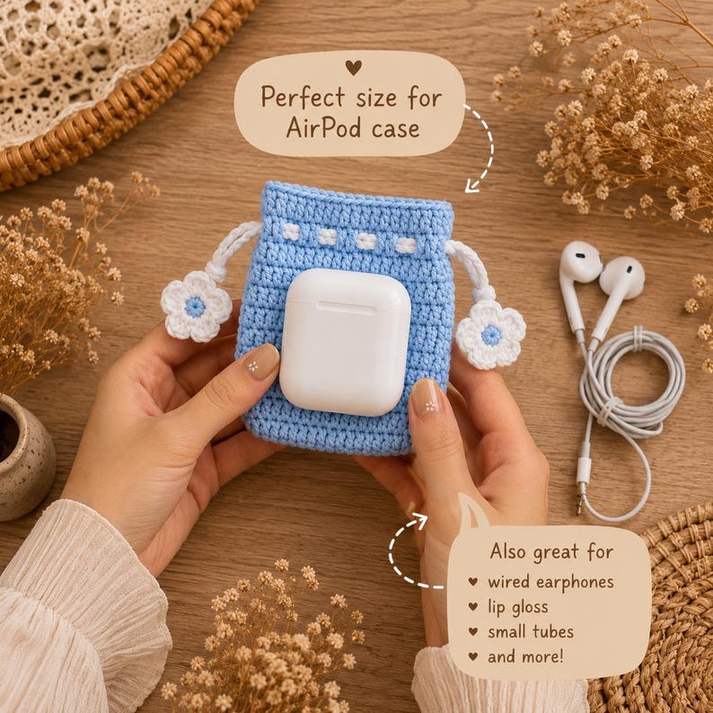 May include: A light blue crochet drawstring pouch featuring white flower-shaped toggles on the cords. The pouch has a white rectangular pocket on the front containing a white AirPod case. Text on the image reads: Perfect size for AirPod case and Also great for wired earphones, lip gloss, small tubes, and more!