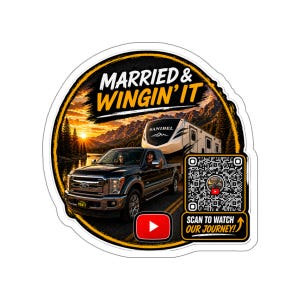 May include: A sticker featuring a black pickup truck towing a white and beige RV, set against a scenic mountain and sunset backdrop. The text "MARRIED & WINGIN' IT" is displayed above the vehicles. Includes a QR code and a YouTube play button.